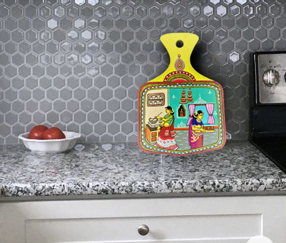 Two women in kitchen wall plate
